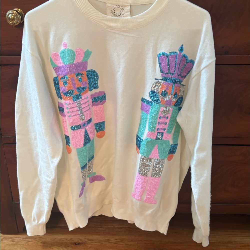 Fantastic Fawn White Sweater with Colorful Nutcracker Design